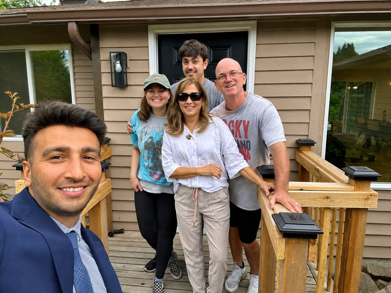 Alican Bodur with the Auburn buyers after their move to Washington.